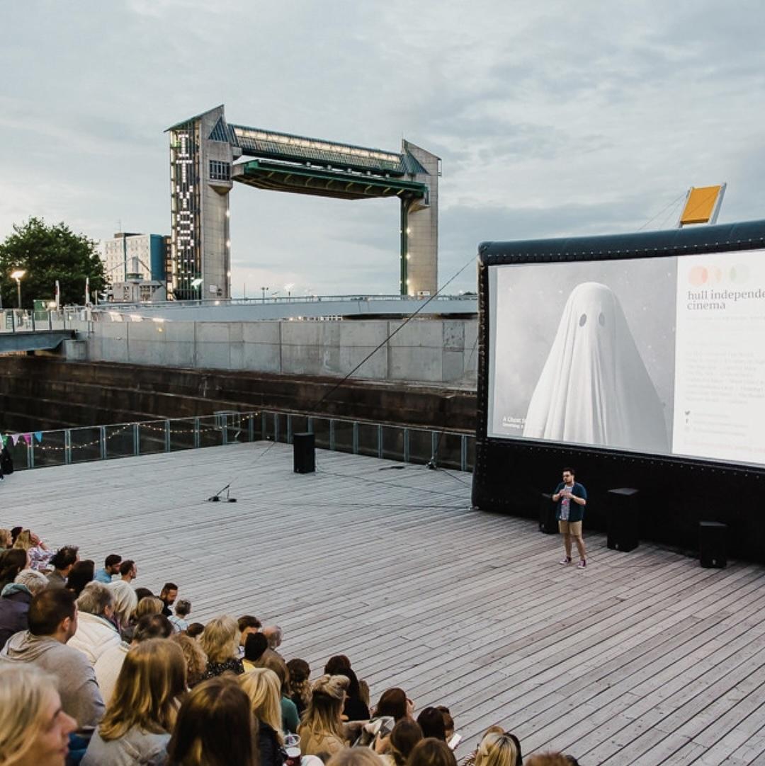 An outdoor cinema audience